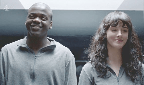 Bing and Abi side-by-side in an elevator. Bing grins, Abi smiles