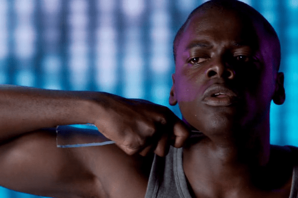 Bing holds a large shard of broken glass to his throat